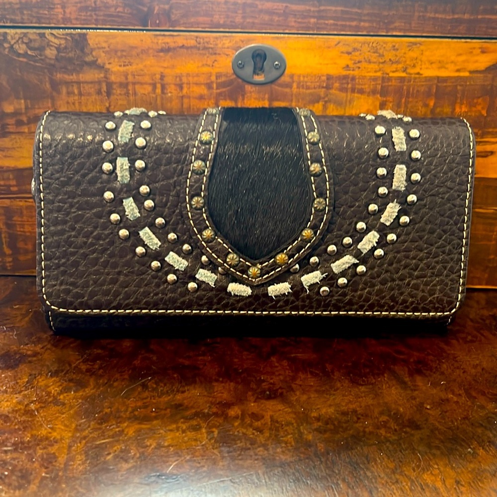 Genuine leather wallet with cowhide, suede, and jewel embellishments.